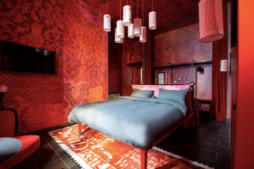 Imagen de la habitación del Hotel 25hours Florence Piazza San Paolino. Foto 16