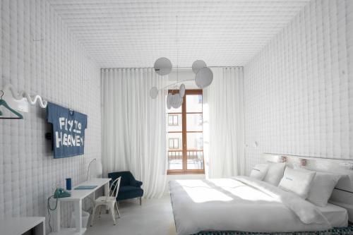 Imagen de la habitación del Hotel 25hours Florence Piazza San Paolino. Foto 17