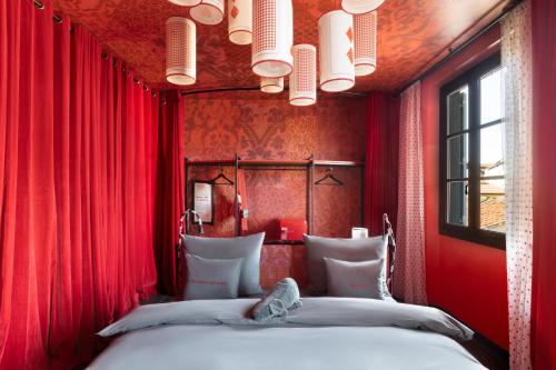 Imagen de la habitación del Hotel 25hours Florence Piazza San Paolino. Foto 20