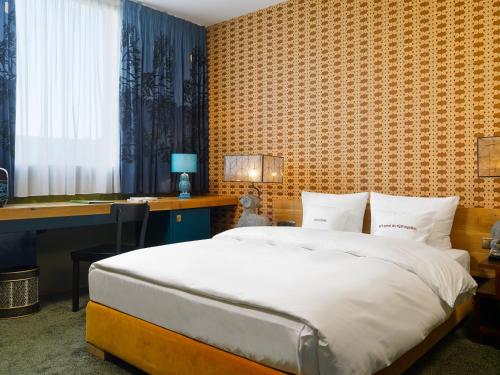 Imagen de la habitación del Hotel 25hours Frankfurt The Goldman. Foto 12