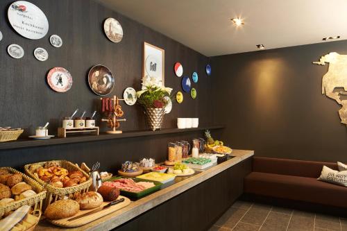 Imagen del bar/restaurante del Hotel 25hours Frankfurt The Goldman. Foto 10