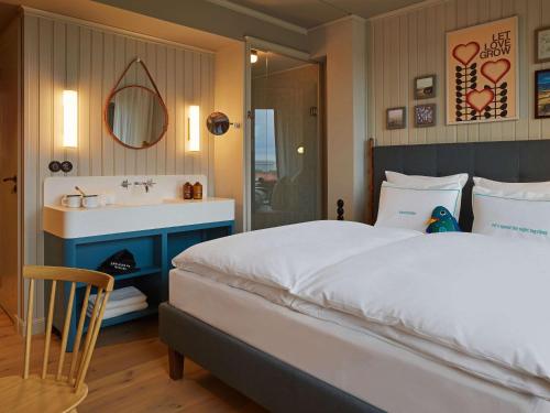 Imagen de la habitación del Hotel 25hours Paper Island. Foto 7