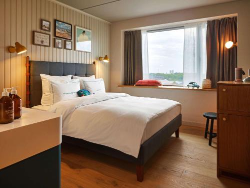 Imagen de la habitación del Hotel 25hours Paper Island. Foto 10