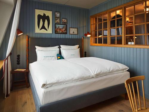 Imagen de la habitación del Hotel 25hours Paper Island. Foto 12