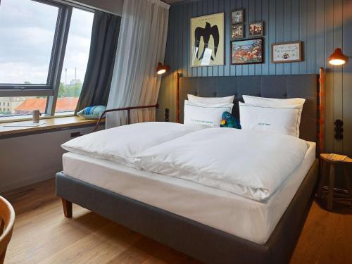 Imagen de la habitación del Hotel 25hours Paper Island. Foto 14