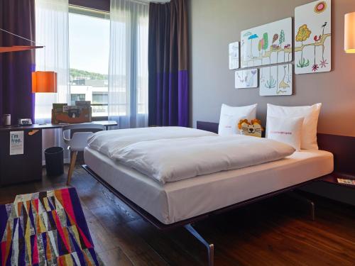 Imagen de la habitación del Hotel 25hours Zurich West. Foto 17