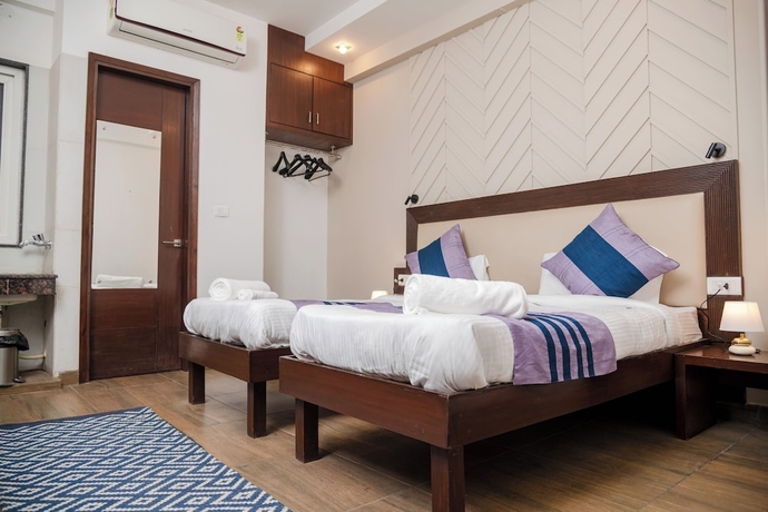 Imagen de la habitación del Hotel 26 Vamsor Heights. Foto 3