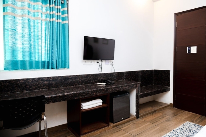 Imagen de la habitación del Hotel 26 Vamsor Heights. Foto 14