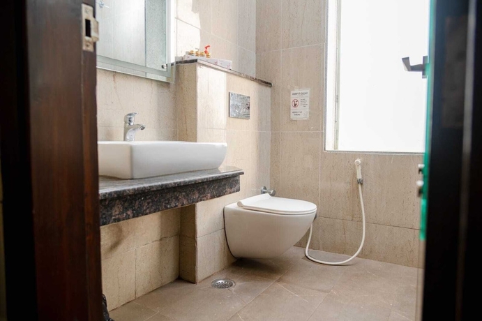 Imagen de la habitación del Hotel 26 Vamsor Heights. Foto 15