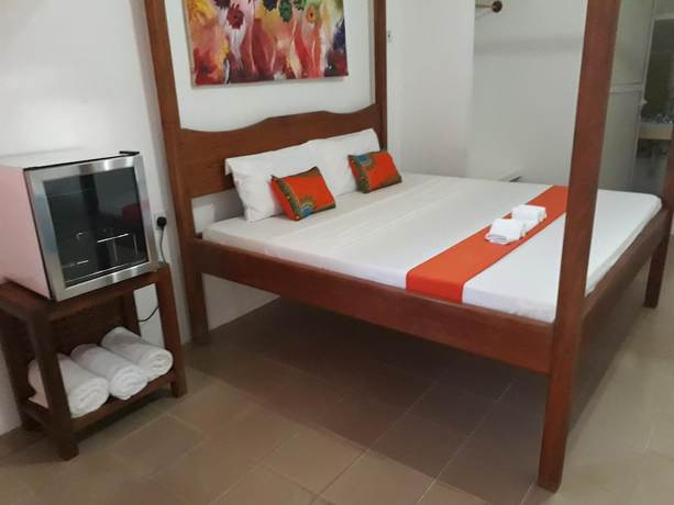 Imagen de la habitación del Hotel 27 Cafe Zanzibar Airport. Foto 7