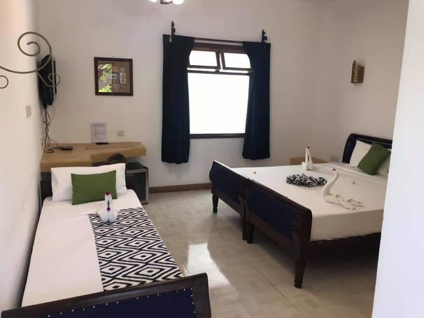 Imagen de la habitación del Hotel 27 Cafe Zanzibar Airport. Foto 8