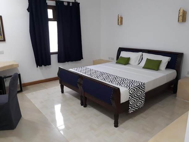 Imagen de la habitación del Hotel 27 Cafe Zanzibar Airport. Foto 10