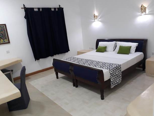 Imagen de la habitación del Hotel 27 Cafe Zanzibar Airport. Foto 13