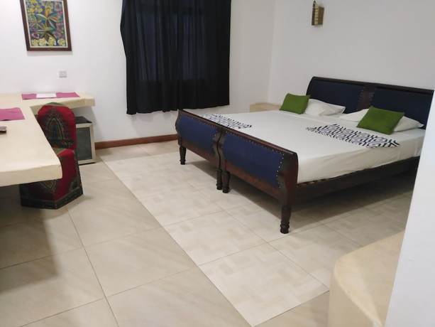 Imagen de la habitación del Hotel 27 Cafe Zanzibar Airport. Foto 16