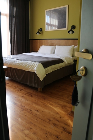 Imagen de la habitación del Hotel 27. Foto 6