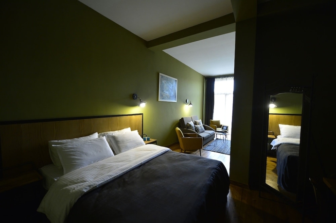 Imagen de la habitación del Hotel 27. Foto 9