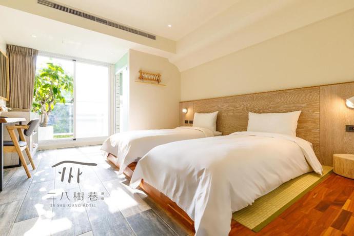 Imagen de la habitación del Hotel 28shuxiang. Foto 5