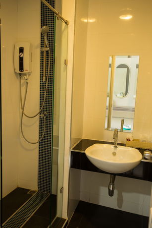 Imagen de la habitación del Hotel 3 Kwan Village. Foto 9