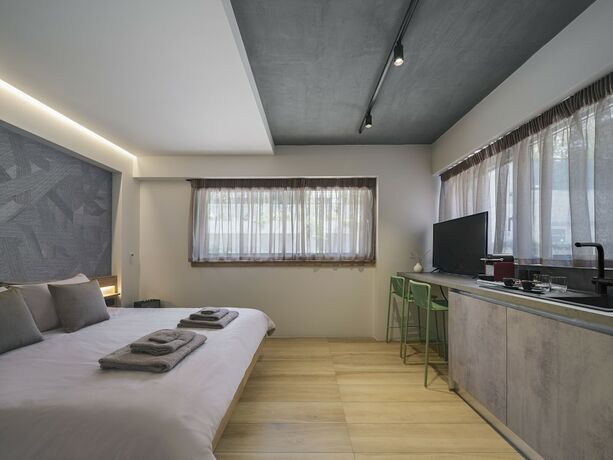 Imagen de la habitación del Hotel 3 Olive Trees. Foto 15