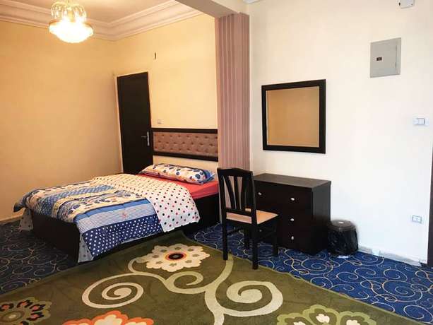 Imagen de la habitación del Hotel 3 Pyramids View Inn. Foto 7