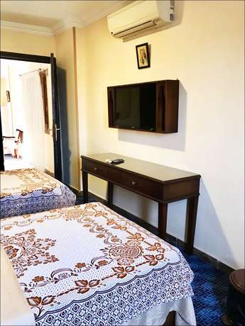 Imagen de la habitación del Hotel 3 Pyramids View Inn. Foto 15