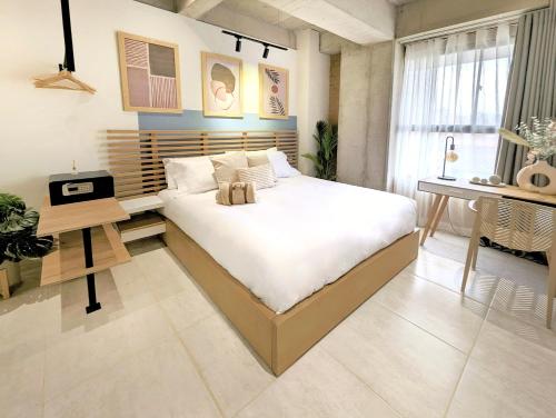 Imagen de la habitación del Hotel 30 Living Suites Laureles. Foto 16