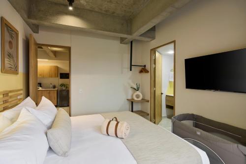 Imagen de la habitación del Hotel 30 Living Suites Laureles. Foto 18