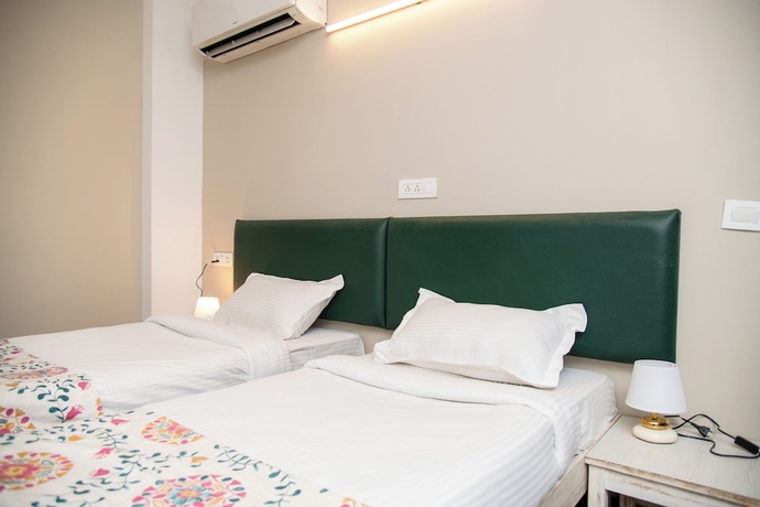 Imagen de la habitación del Hotel 30 Vamsor Heights. Foto 2