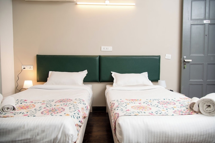 Imagen de la habitación del Hotel 30 Vamsor Heights. Foto 3