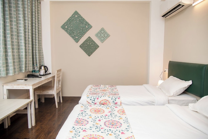 Imagen de la habitación del Hotel 30 Vamsor Heights. Foto 5