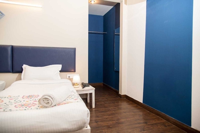 Imagen de la habitación del Hotel 30 Vamsor Heights. Foto 6