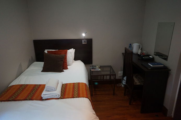 Imagen de la habitación del Hotel 314 On Clark Guest House. Foto 8