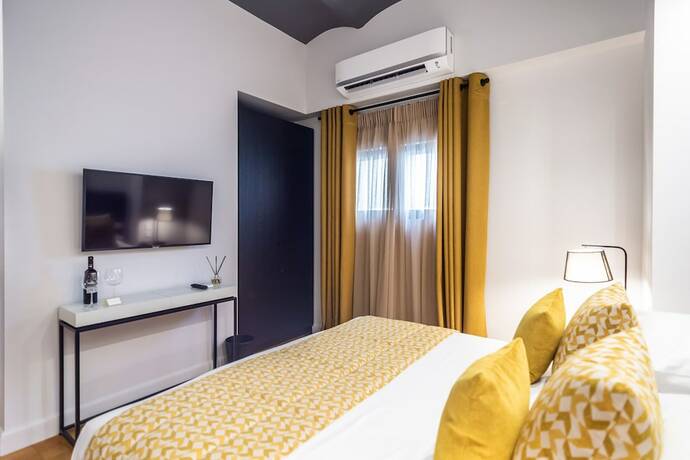 Imagen de la habitación del Hotel 33 Solonos Suites. Foto 13