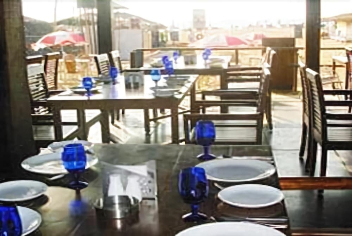 Imagen del bar/restaurante del Hotel 360 Degree Beach Retreat. Foto 2