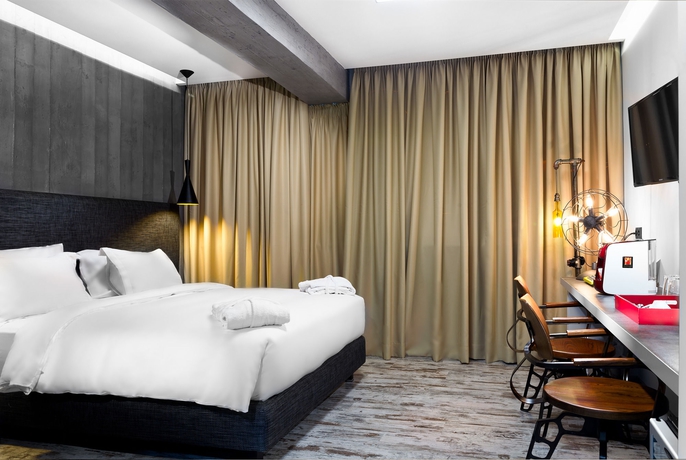 Imagen de la habitación del Hotel 360 Degrees. Foto 15