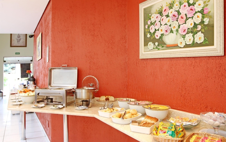 Imagen del bar/restaurante del Hotel 360 Suítes Santa Cecília. Foto 5