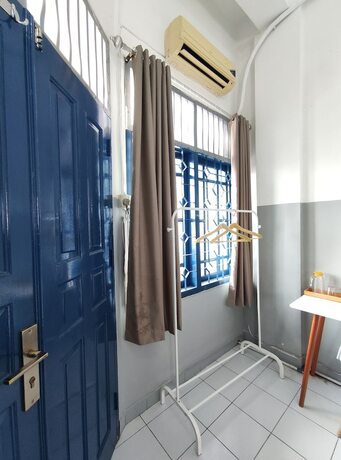 Imagen de la habitación del Hotel 360Homestay. Foto 7