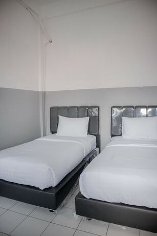 Imagen de la habitación del Hotel 360Homestay. Foto 9