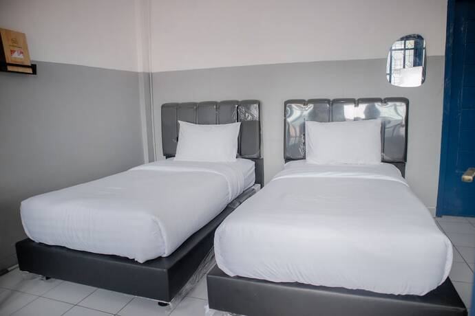 Imagen de la habitación del Hotel 360Homestay. Foto 10