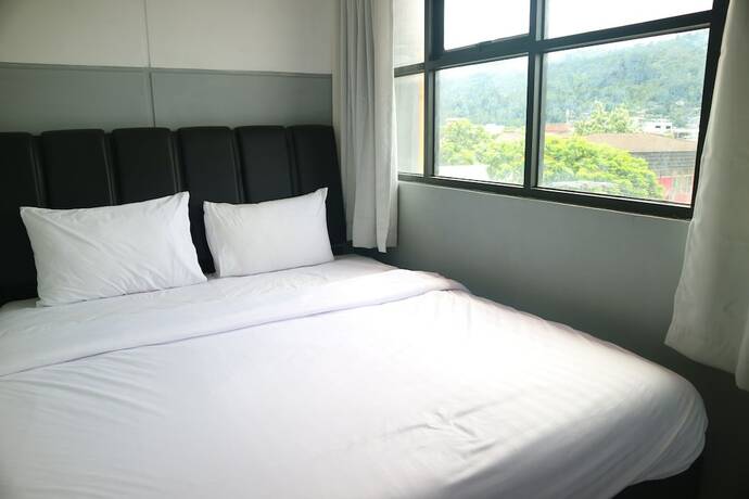 Imagen de la habitación del Hotel 360Homestay. Foto 11