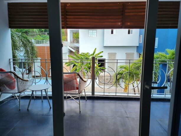 Imagen de la habitación del Hotel 39 Jamaica. Foto 16