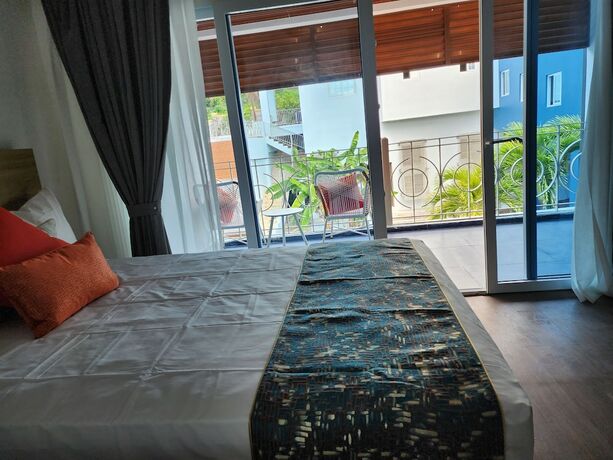 Imagen de la habitación del Hotel 39 Jamaica. Foto 17