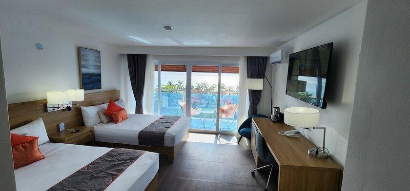 Imagen de la habitación del Hotel 39 Jamaica. Foto 22