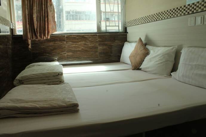Imagen de la habitación del Hotel 3D Inn Dragon Hong Kong. Foto 12
