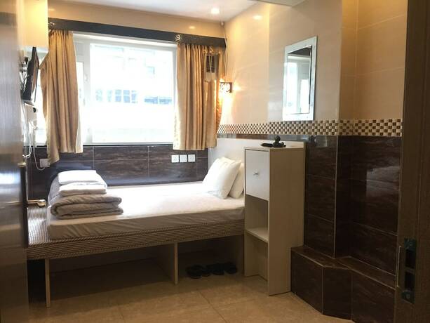 Imagen de la habitación del Hotel 3D Inn Dragon Hong Kong. Foto 13