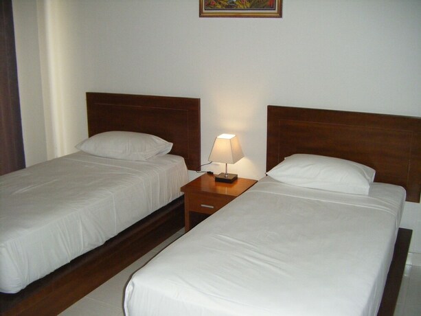 Imagen de la habitación del Hotel 3d Home Stay. Foto 19