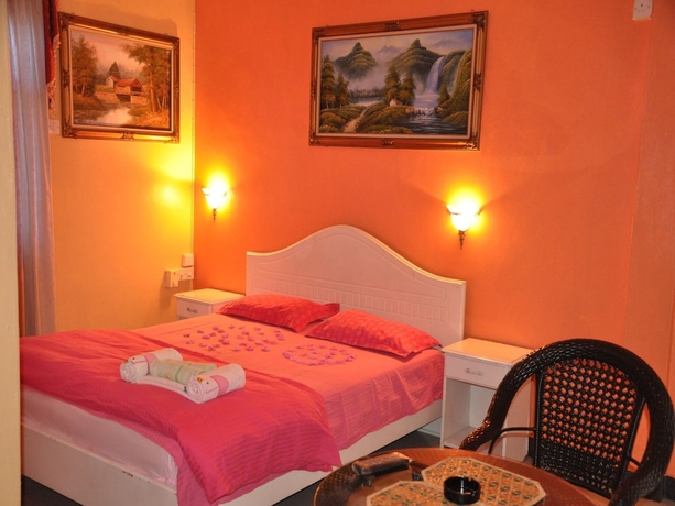 Imagen de la habitación del Hotel 3ds International Tourist Home. Foto 8