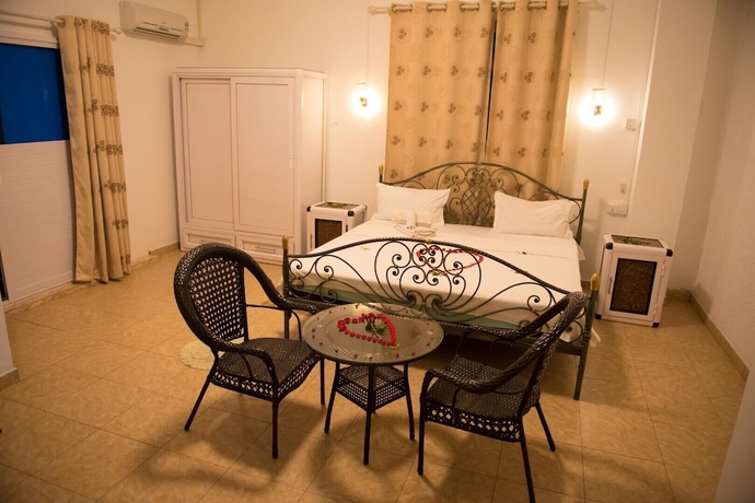 Imagen de la habitación del Hotel 3ds International Tourist Home. Foto 10