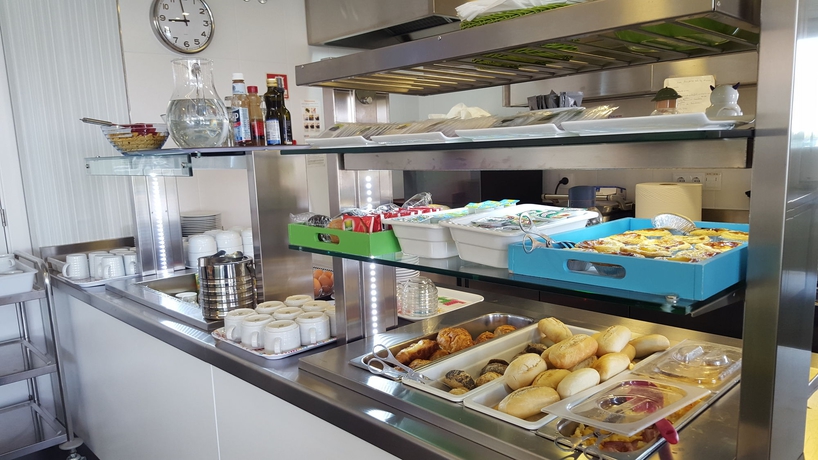 Imagen del bar/restaurante del Hotel 3k Faro Aeroporto. Foto 5