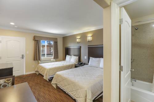 Imagen de la habitación del Hotel 3rd Avenue Inn. Foto 11